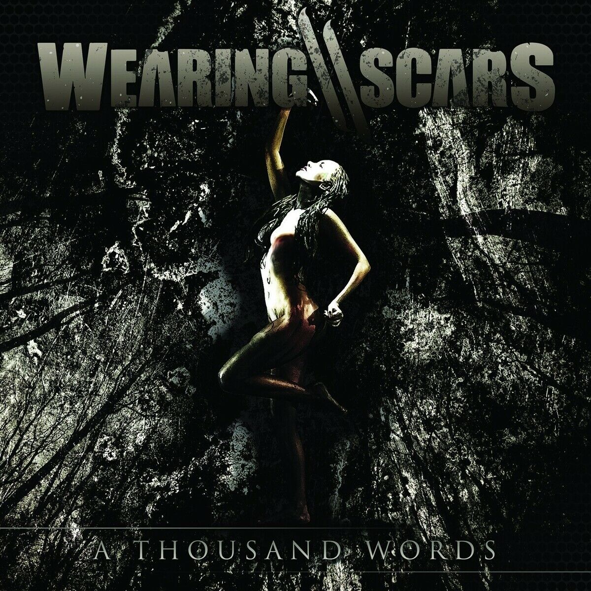 Wearing Scars - A Thousand Words in the group CD / Hårdrock,Pop-Rock at Bengans Skivbutik AB (1387214)