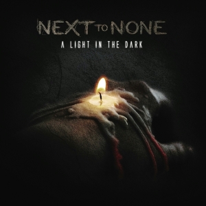 Next To None - A Light In The Dark in the group OTHER / Övrigt / at Bengans Skivbutik AB (4048945)