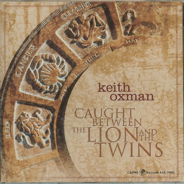 Keith Oxman - Caught Between The Lion And The Twi in the group CD / Bestsellers at Bengans Skivbutik AB (5558977)